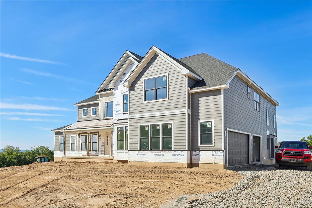 3237 Michaels School Road, Unit 9 Nazareth, PA 18064 - Photo 4 of 56 New construction home progress showcases gabled rooflines and sleek horizontal siding.