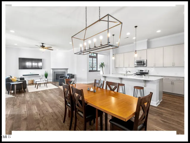 a kitchen with kitchen island granite countertop a sink and counter space