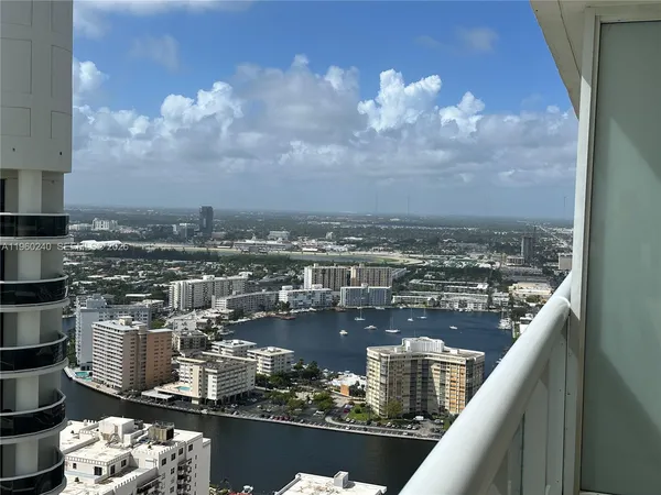 a view of a lake from a balcony