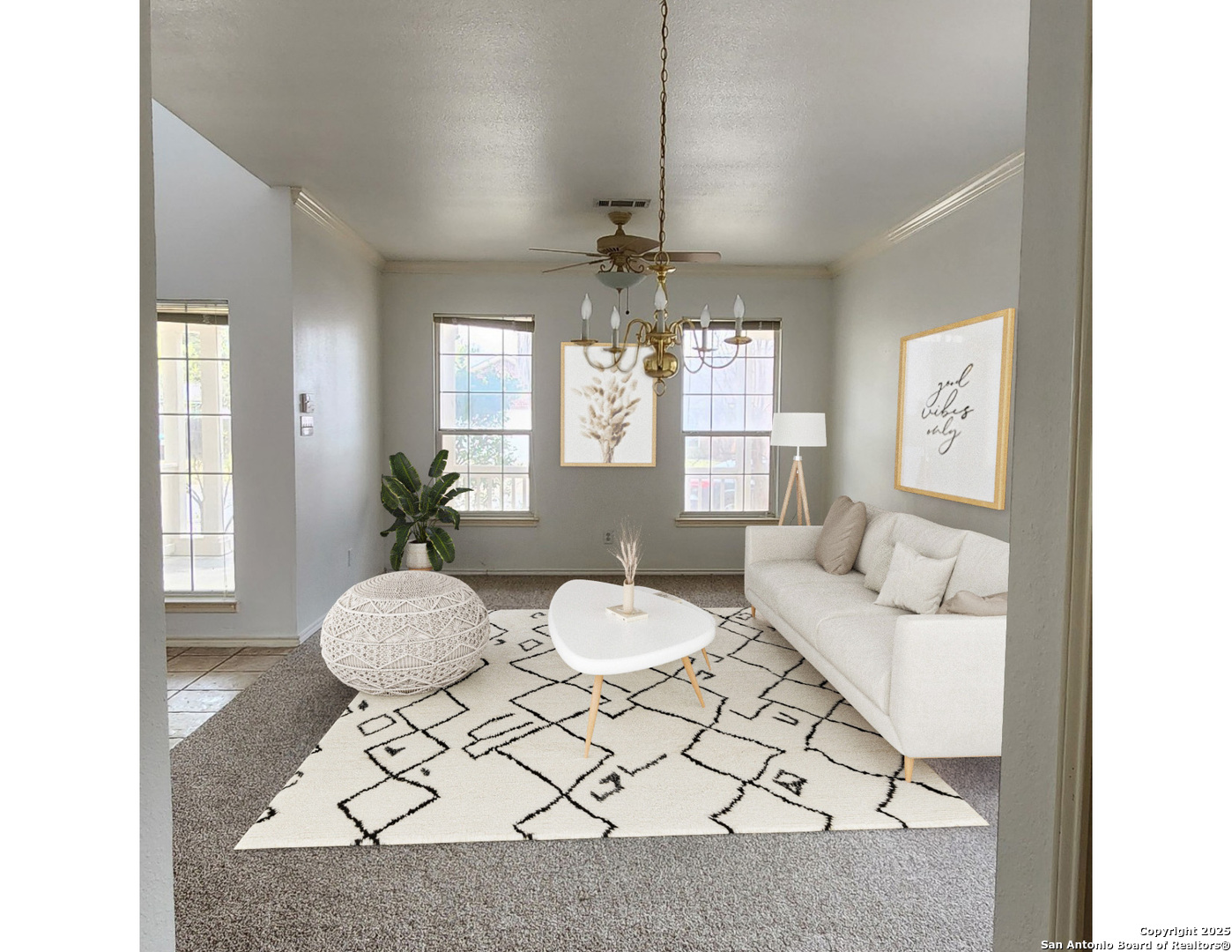 9318 Grand Cedar Helotes, TX 78023 - Photo 2 of 32 a living room with furniture and a chandelier