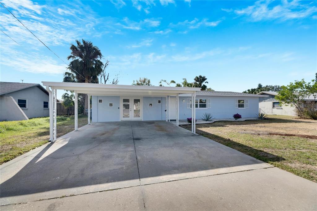 660 Flamingo Drive Apollo Beach, FL 33572 - Photo 7 of 63 a view of a house with a entertaining space