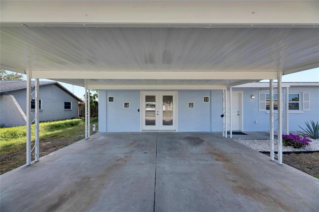660 Flamingo Drive Apollo Beach, FL 33572 - Photo 8 of 63 a view of a house basement space and porch