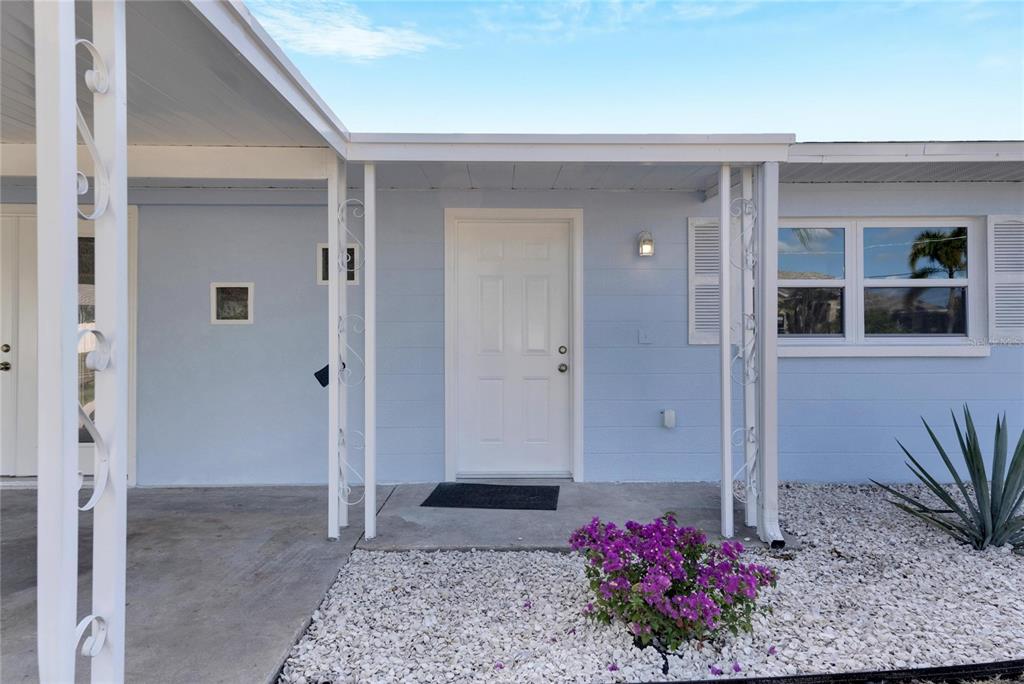 660 Flamingo Drive Apollo Beach, FL 33572 - Photo 9 of 63 a view of entryway with wooden floor