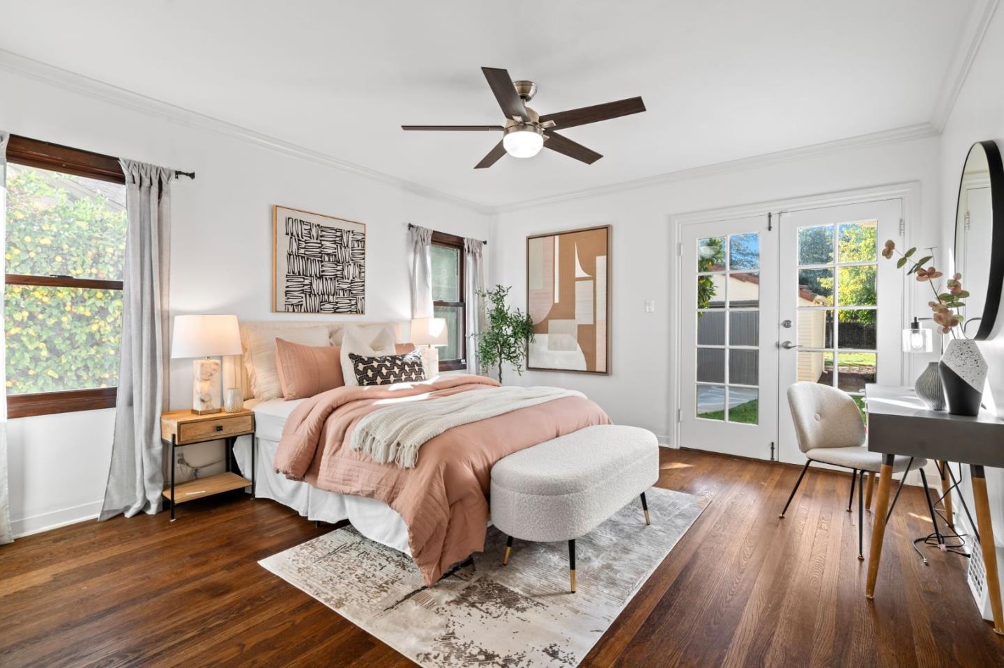 975 Riverside Drive San Jose, CA 95125 - Photo 21 of 46 a bedroom with a bed and wooden floor