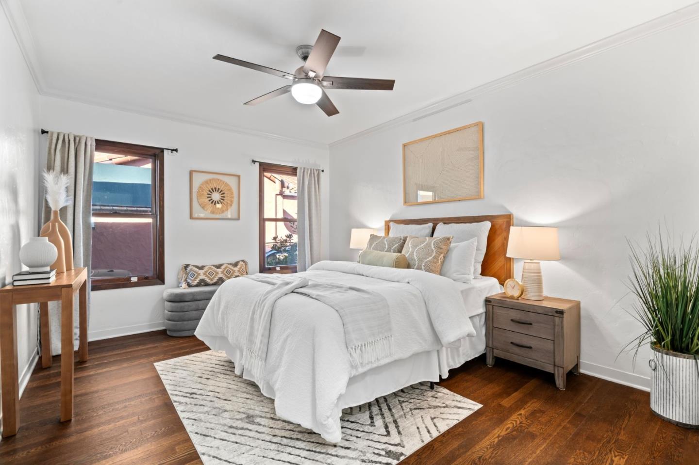 975 Riverside Drive San Jose, CA 95125 - Photo 24 of 46 a bedroom with a bed and wooden floor