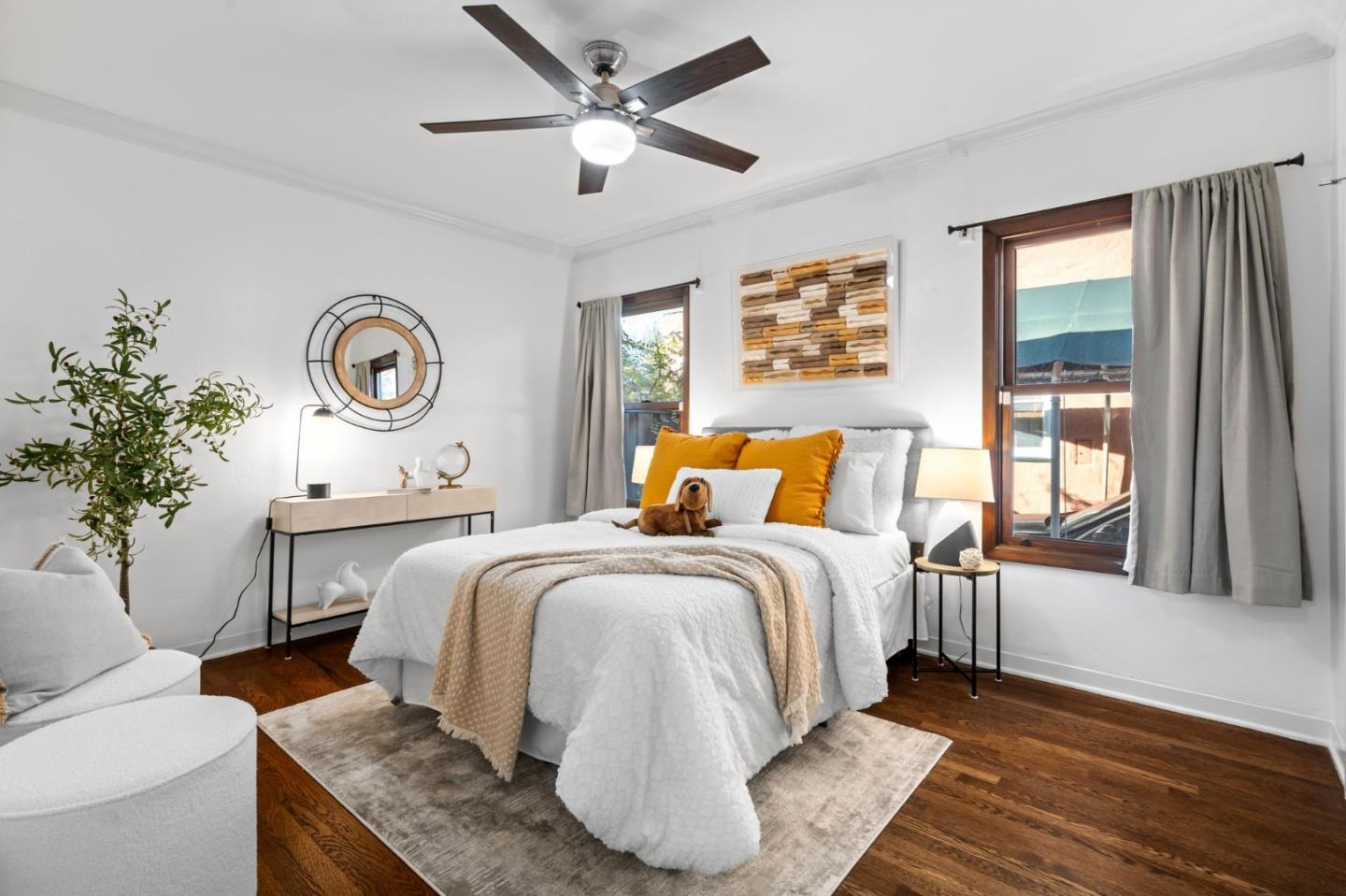 975 Riverside Drive San Jose, CA 95125 - Photo 25 of 46 a bedroom with a bed and a chandelier