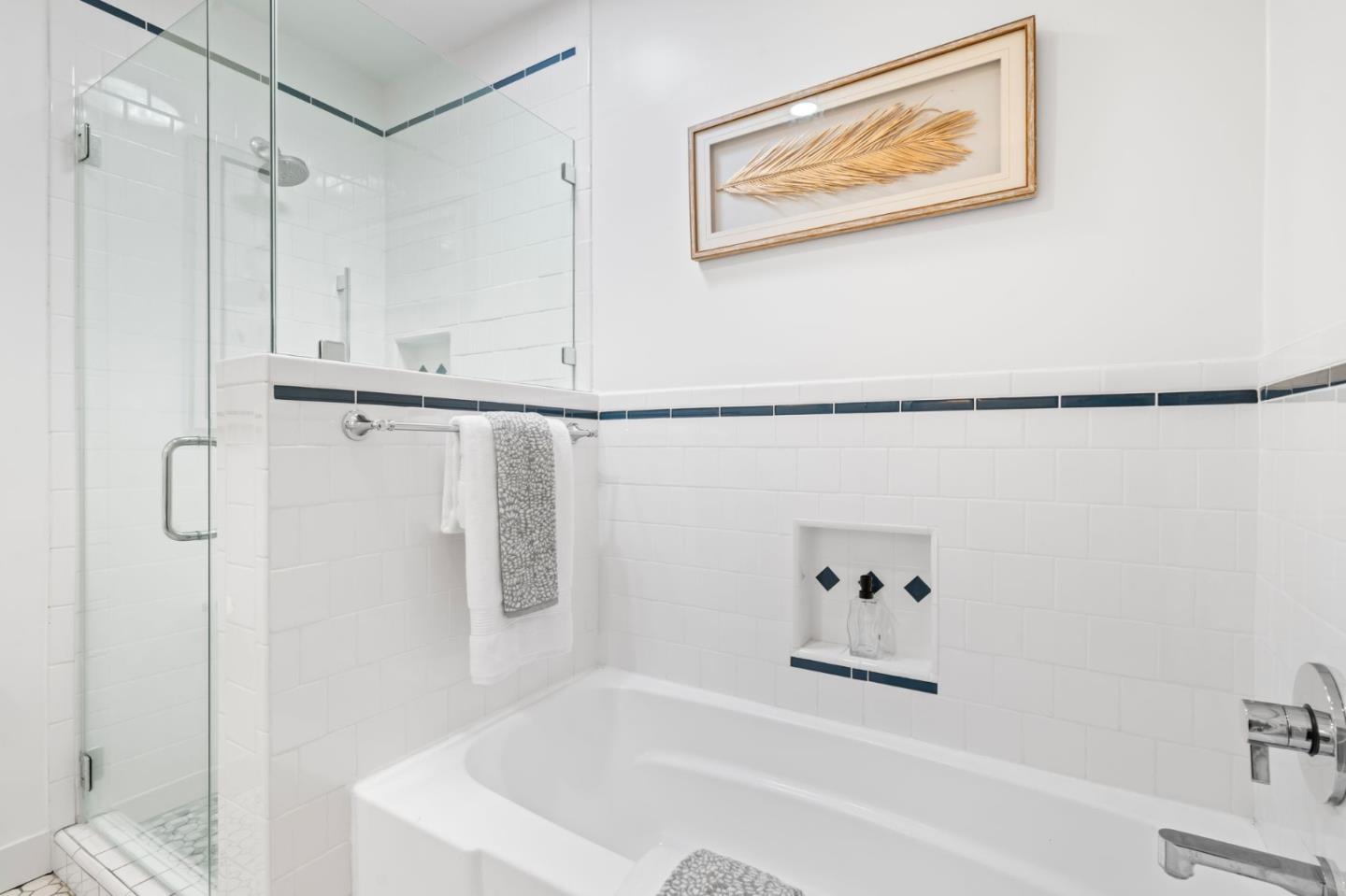 975 Riverside Drive San Jose, CA 95125 - Photo 27 of 46 a bathroom with a bathtub and a shower