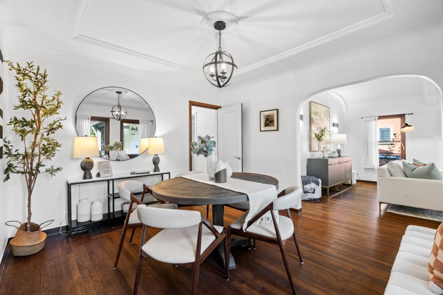 975 Riverside Drive San Jose, CA 95125 - Photo 4 of 46 a view of a dining room with furniture wooden floor and a chandelier