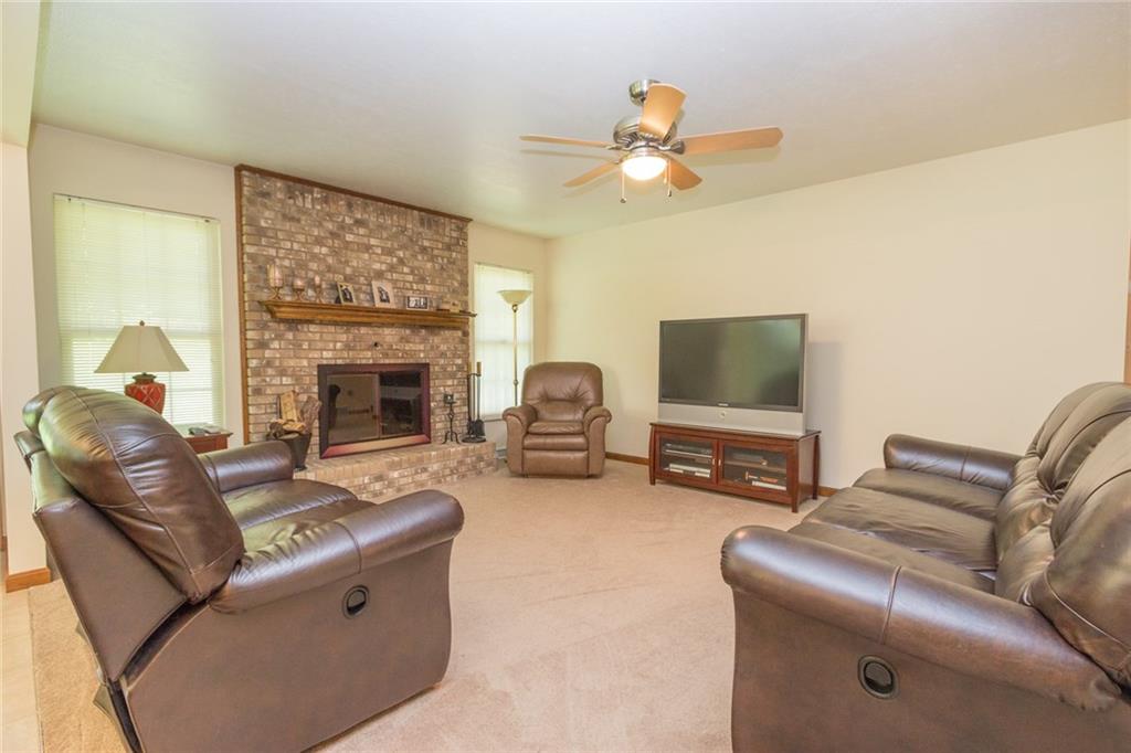 360 Barclay Hill Road Beaver, PA 15009 - Photo 5 of 20 Spacious living room with wood burning fireplace and open to the large kitchen/dining area.