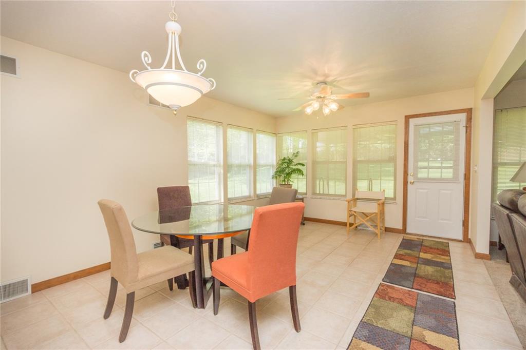 360 Barclay Hill Road Beaver, PA 15009 - Photo 9 of 20 Over-sized dining area, with additional space and access to a covered patio and a picture perfect fenced yard!