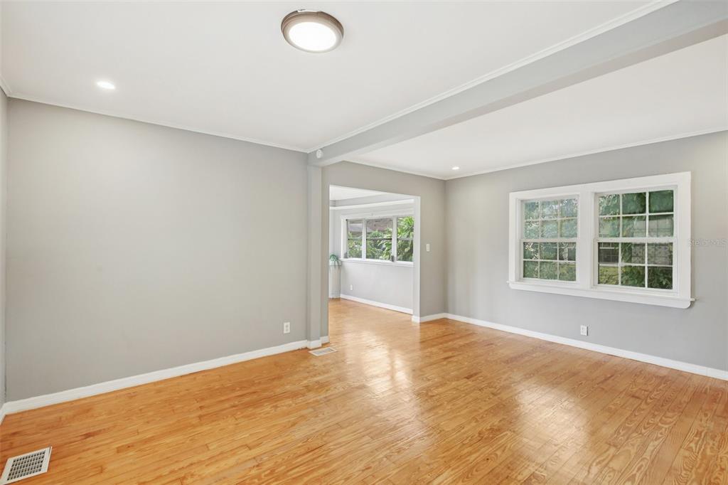 924 Vistabula Street Lakeland, FL 33801 - Photo 16 of 53 an empty room with wooden floor and windows