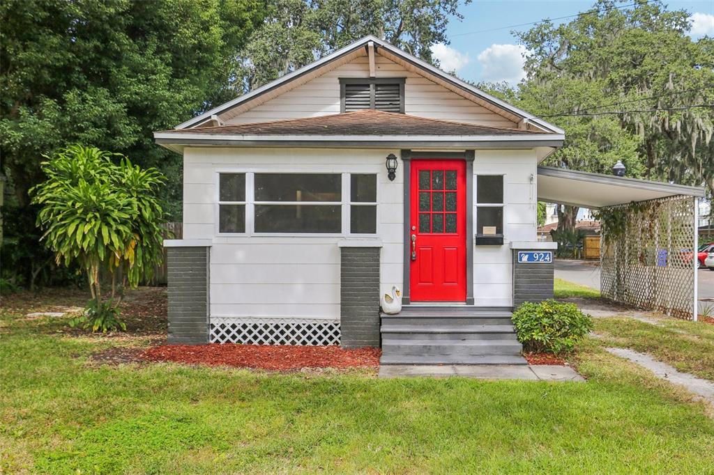 924 Vistabula Street Lakeland, FL 33801 - Photo 2 of 53 a front view of a house with a yard
