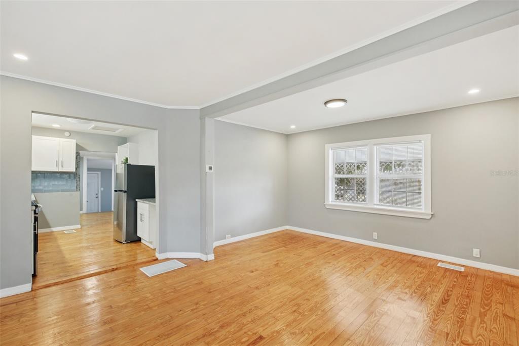 924 Vistabula Street Lakeland, FL 33801 - Photo 23 of 53 a view of a big room with wooden floor and windows