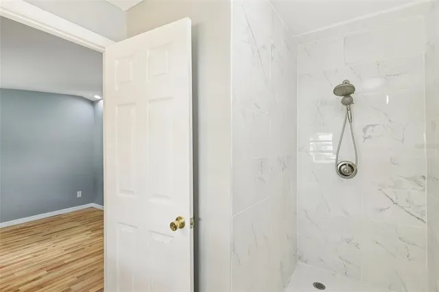 a white toilet sitting next to a bathroom sink
