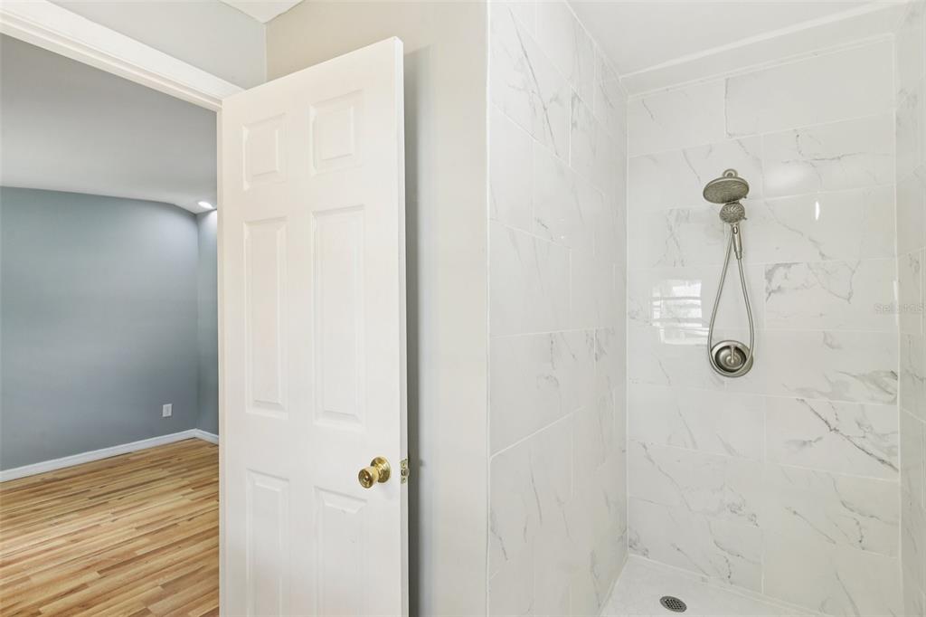 924 Vistabula Street Lakeland, FL 33801 - Photo 24 of 53 a bathroom with a shower
