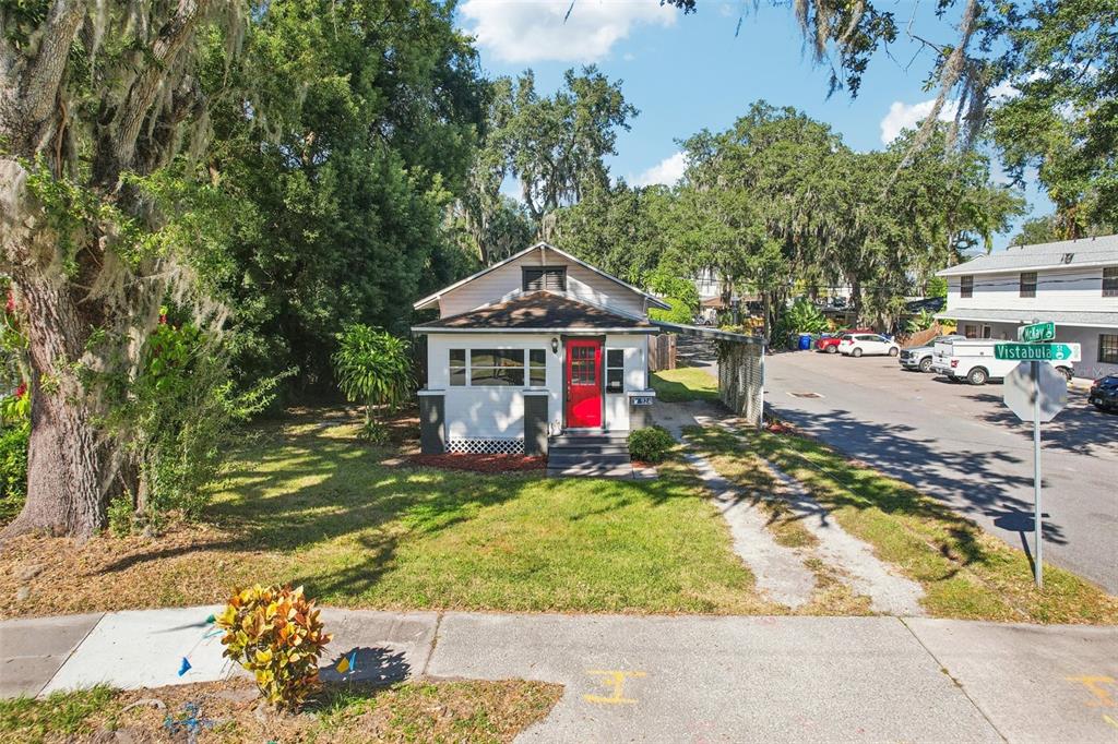 924 Vistabula Street Lakeland, FL 33801 - Photo 42 of 53 a front view of a house with a yard