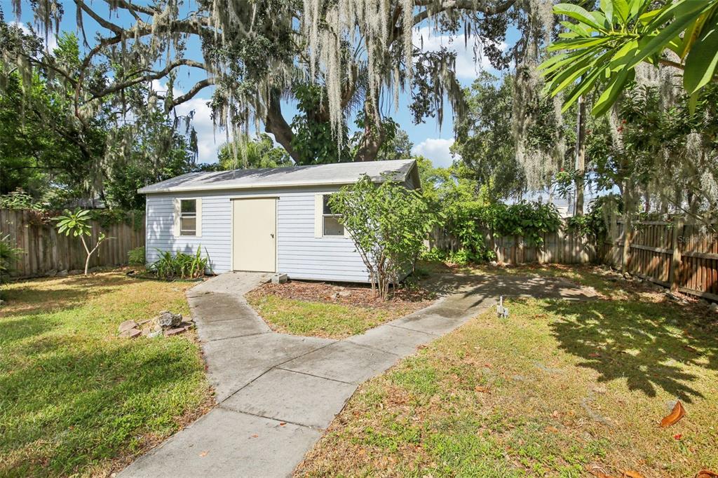 924 Vistabula Street Lakeland, FL 33801 - Photo 46 of 53 a view of a house with backyard and tree