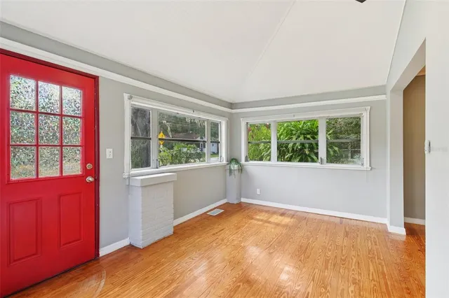 a view of an empty room with a window