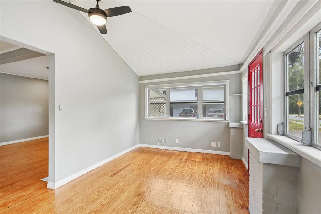 924 Vistabula Street Lakeland, FL 33801 - Photo 8 of 53 wooden floor in an empty room with a window