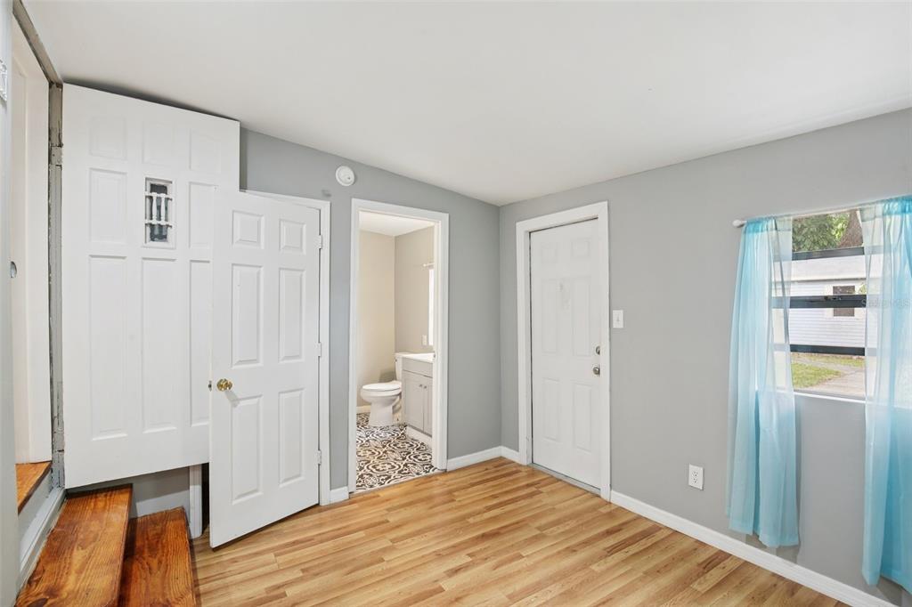 924 Vistabula Street Lakeland, FL 33801 - Photo 9 of 53 a view of a room with wooden floor and bathroom