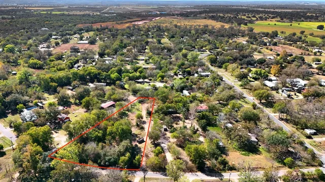 an aerial view of a city with lots of residential buildings