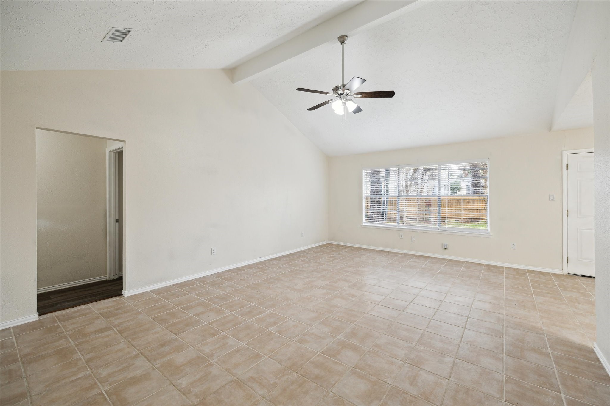 5815 Bridgegate Drive Spring, TX 77373 - Photo 2 of 17 a view of an empty room with a window