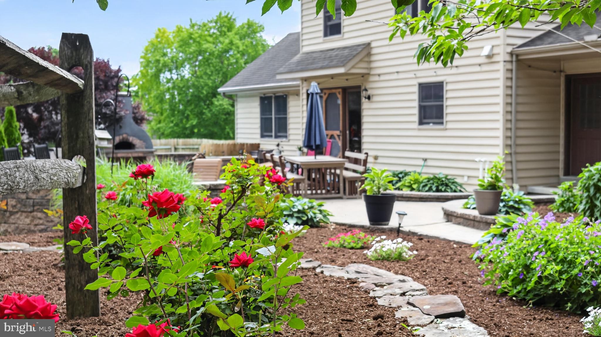 5325 Hammond Road New Holland, PA 17557 - Photo 52 of 73 Charming garden blooms by the home.