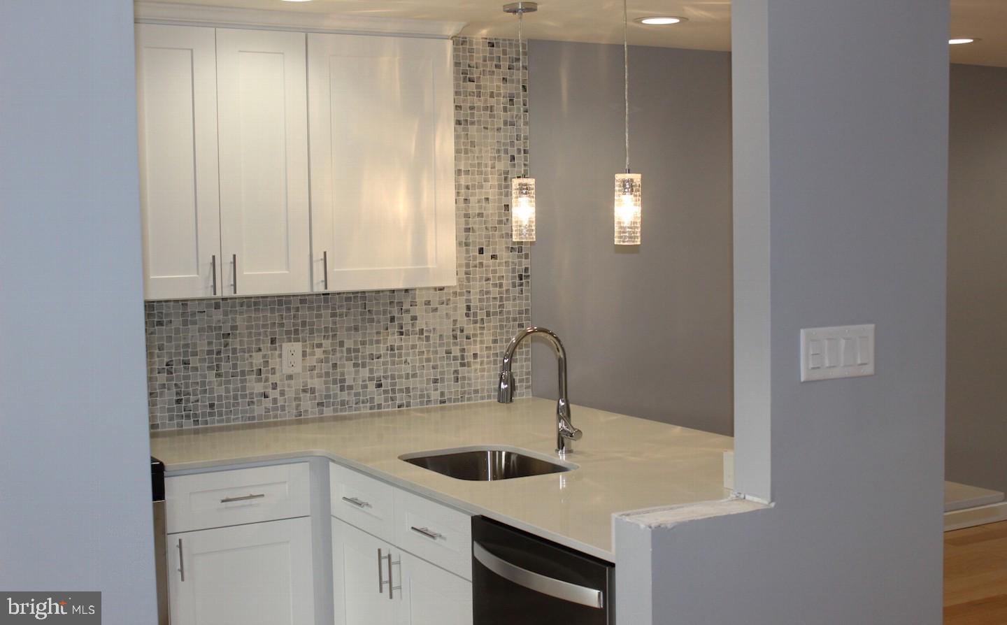 1244 Elson Road Brookhaven, PA 19015 - Photo 9 of 20 a bathroom with a sink and a mirror