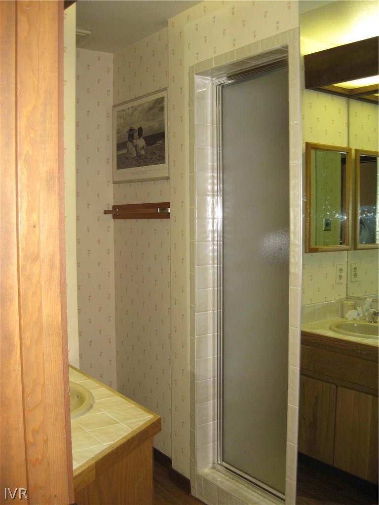 335 Ski Way, Unit 314 Incline Village, NV 89451 - Photo 6 of 15 a bathroom with a sink and a mirror