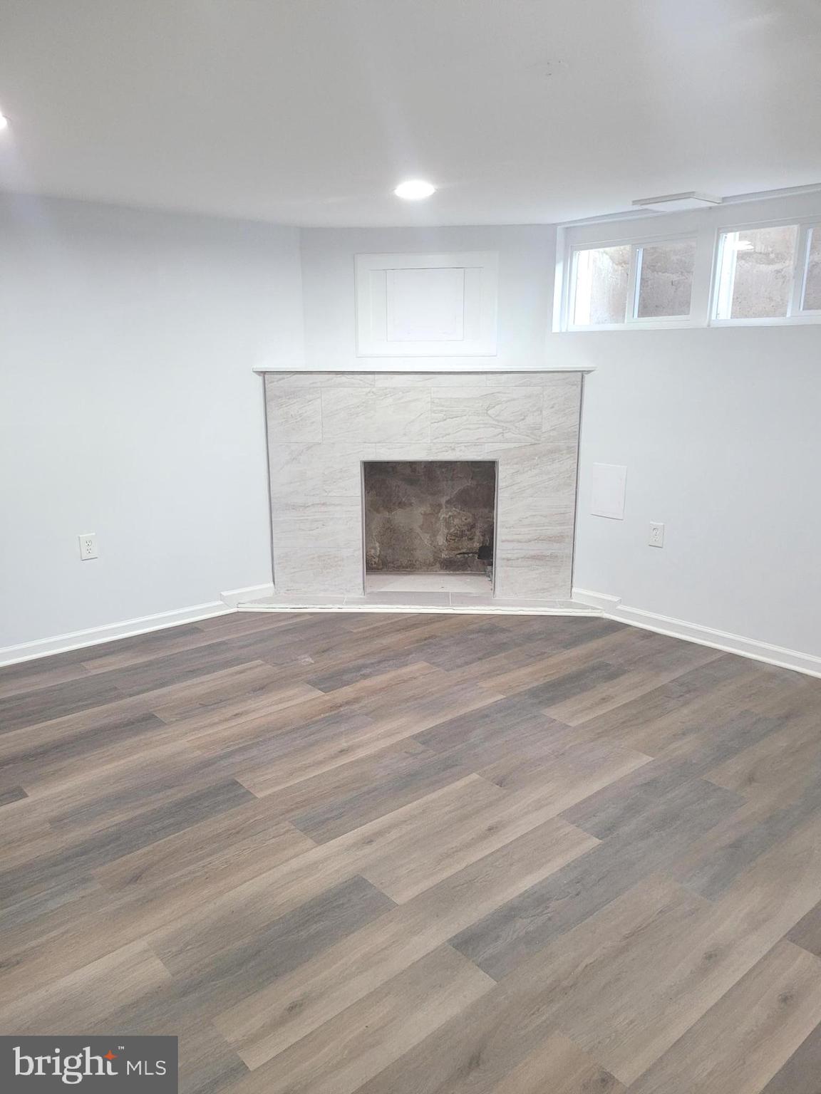 4603 Marble Hall Road Baltimore, MD 21239 - Photo 14 of 24 a view of an empty room and wooden floor