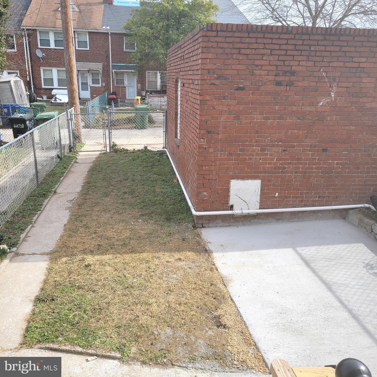 4603 Marble Hall Road Baltimore, MD 21239 - Photo 23 of 24 a view of a patio with chairs and a patio