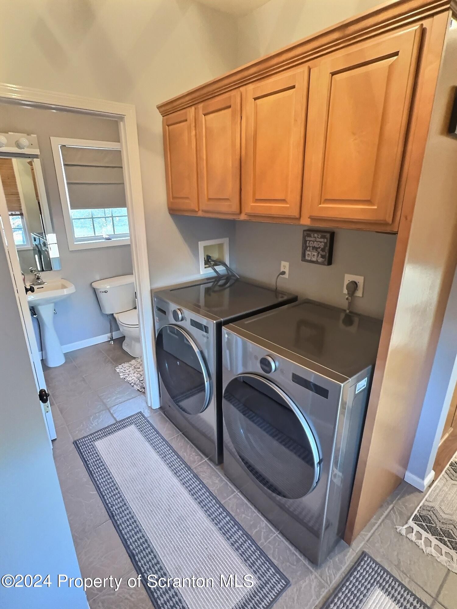 514 Brace Road Dallas, PA 18612 - Photo 17 of 49 a utility room with dryer and washer