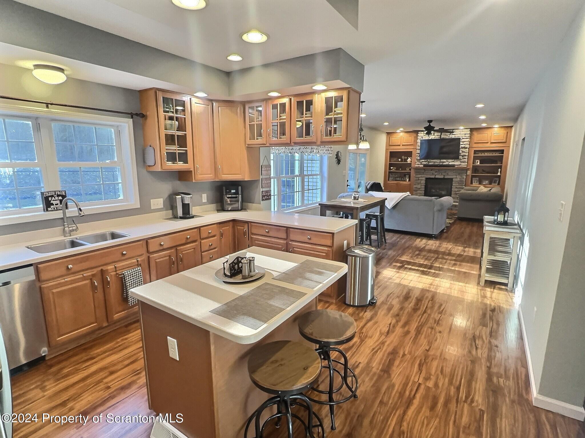 514 Brace Road Dallas, PA 18612 - Photo 2 of 49 a kitchen with a sink stove and cabinets