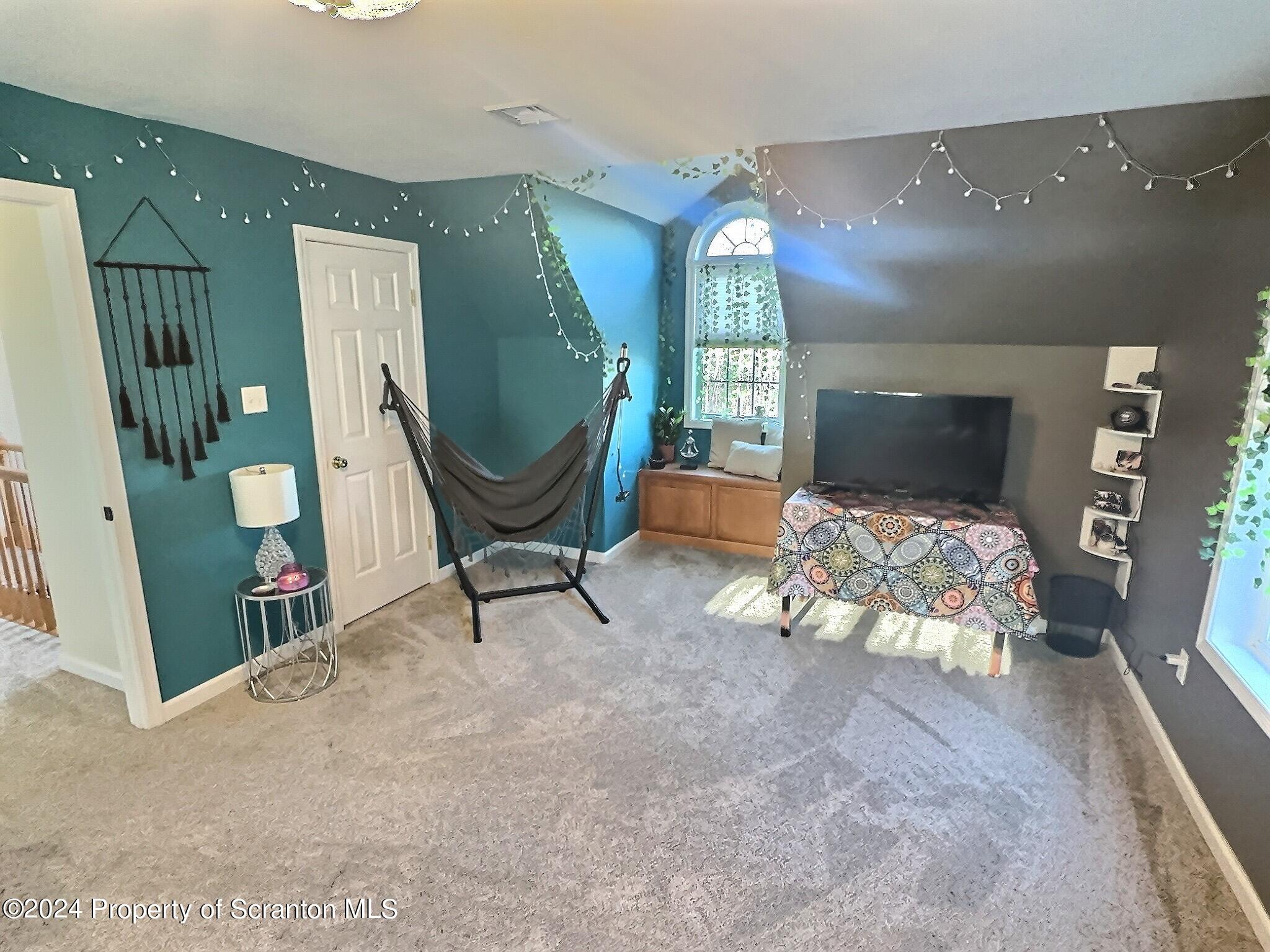 514 Brace Road Dallas, PA 18612 - Photo 34 of 49 a living room with furniture and a fireplace