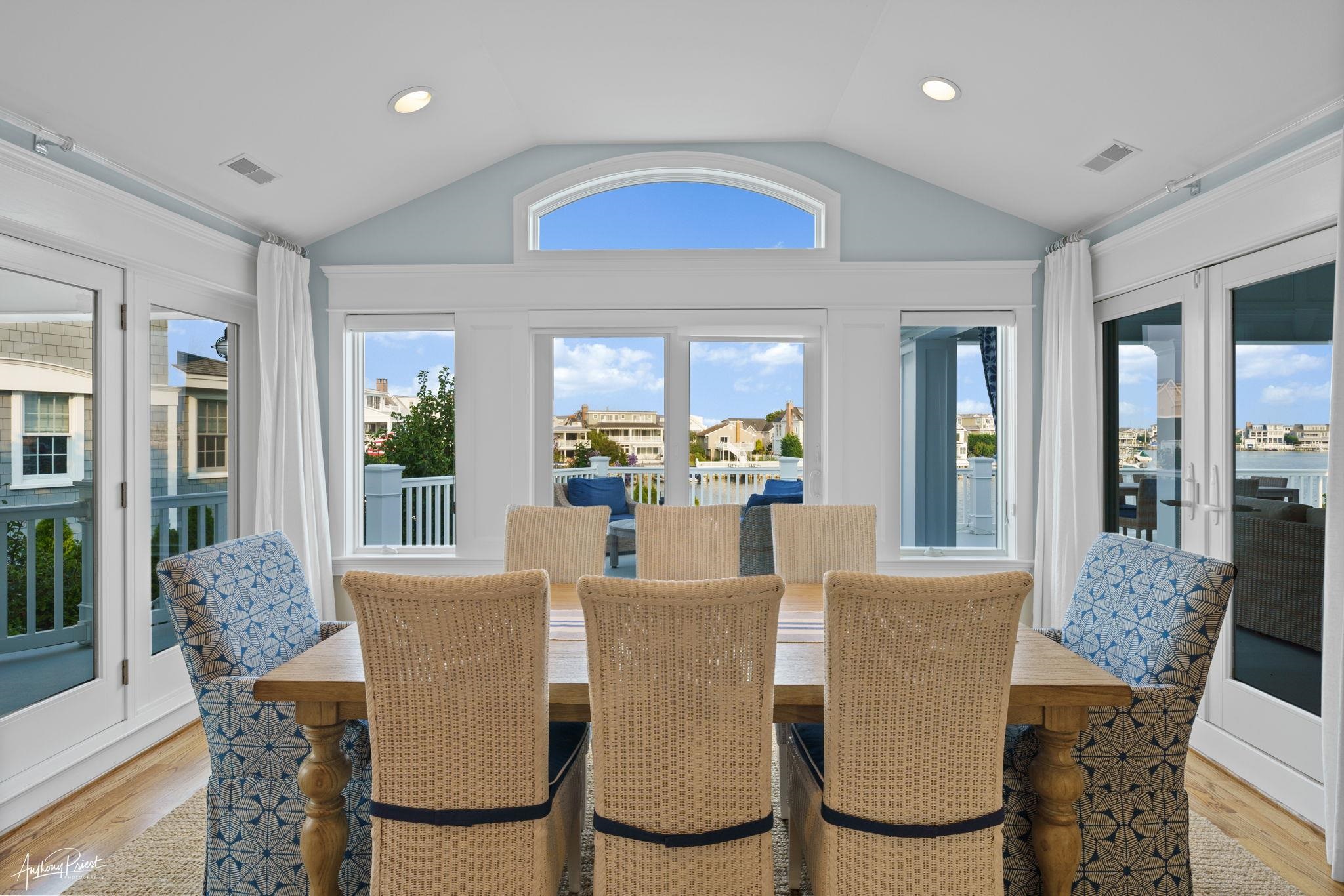 11 Heron Drive Avalon, NJ 08202 - Photo 21 of 29 a view of a dining room with furniture window and wooden floor