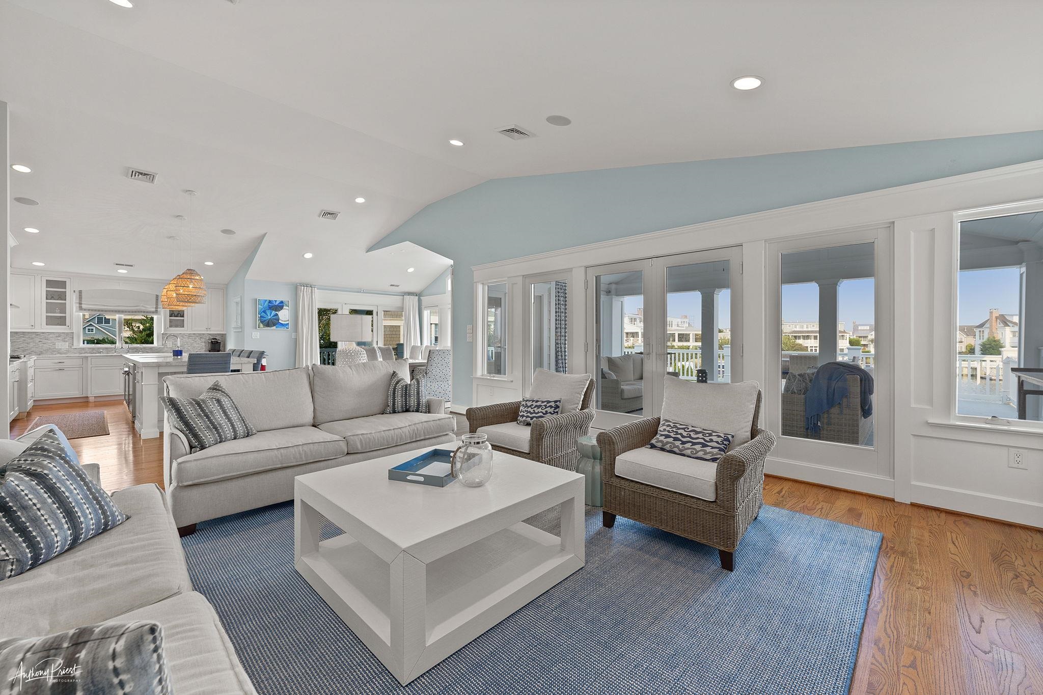11 Heron Drive Avalon, NJ 08202 - Photo 22 of 29 a living room with furniture white walls and wooden floor