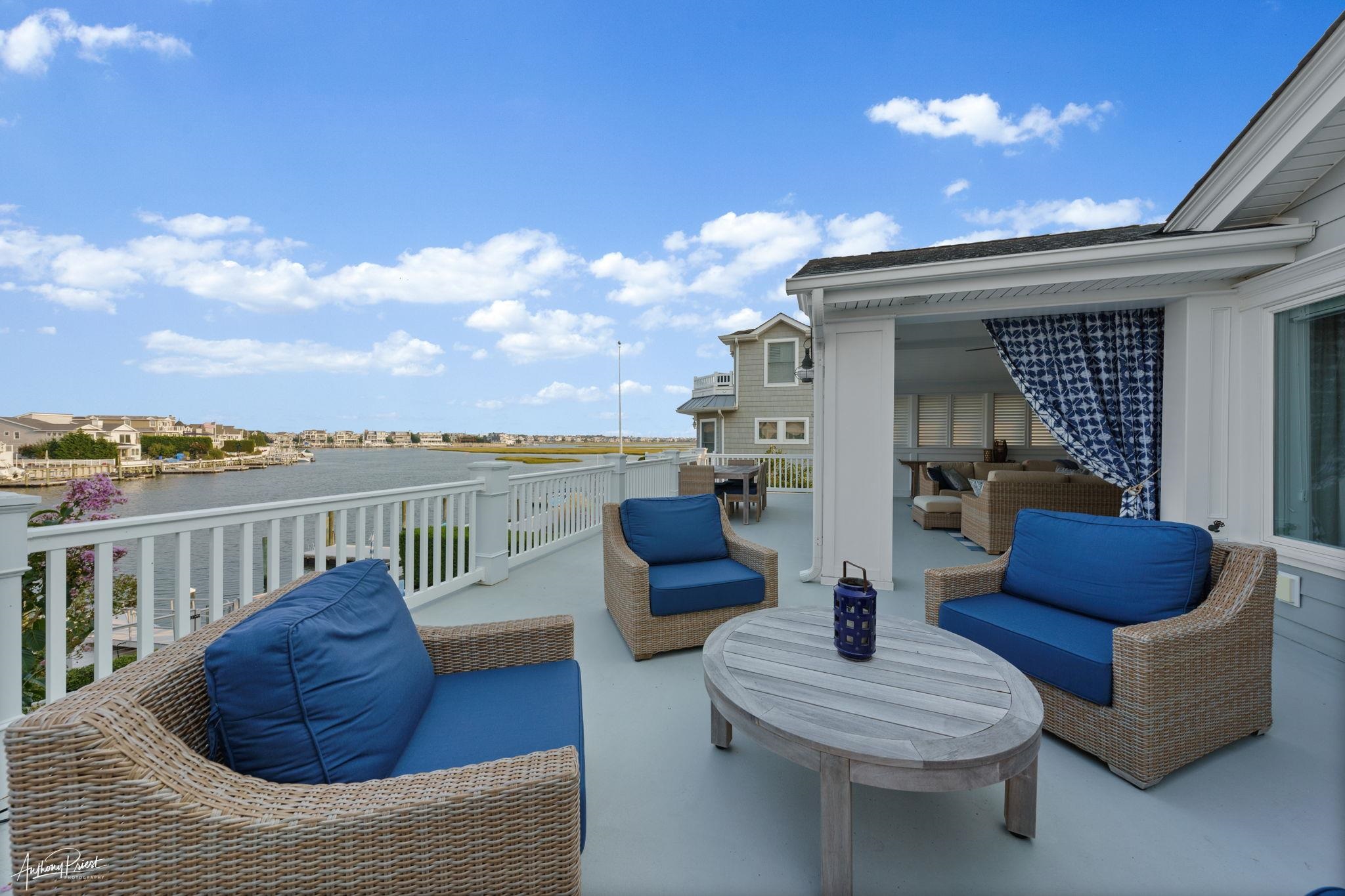 11 Heron Drive Avalon, NJ 08202 - Photo 26 of 29 a view of a roof deck with couches