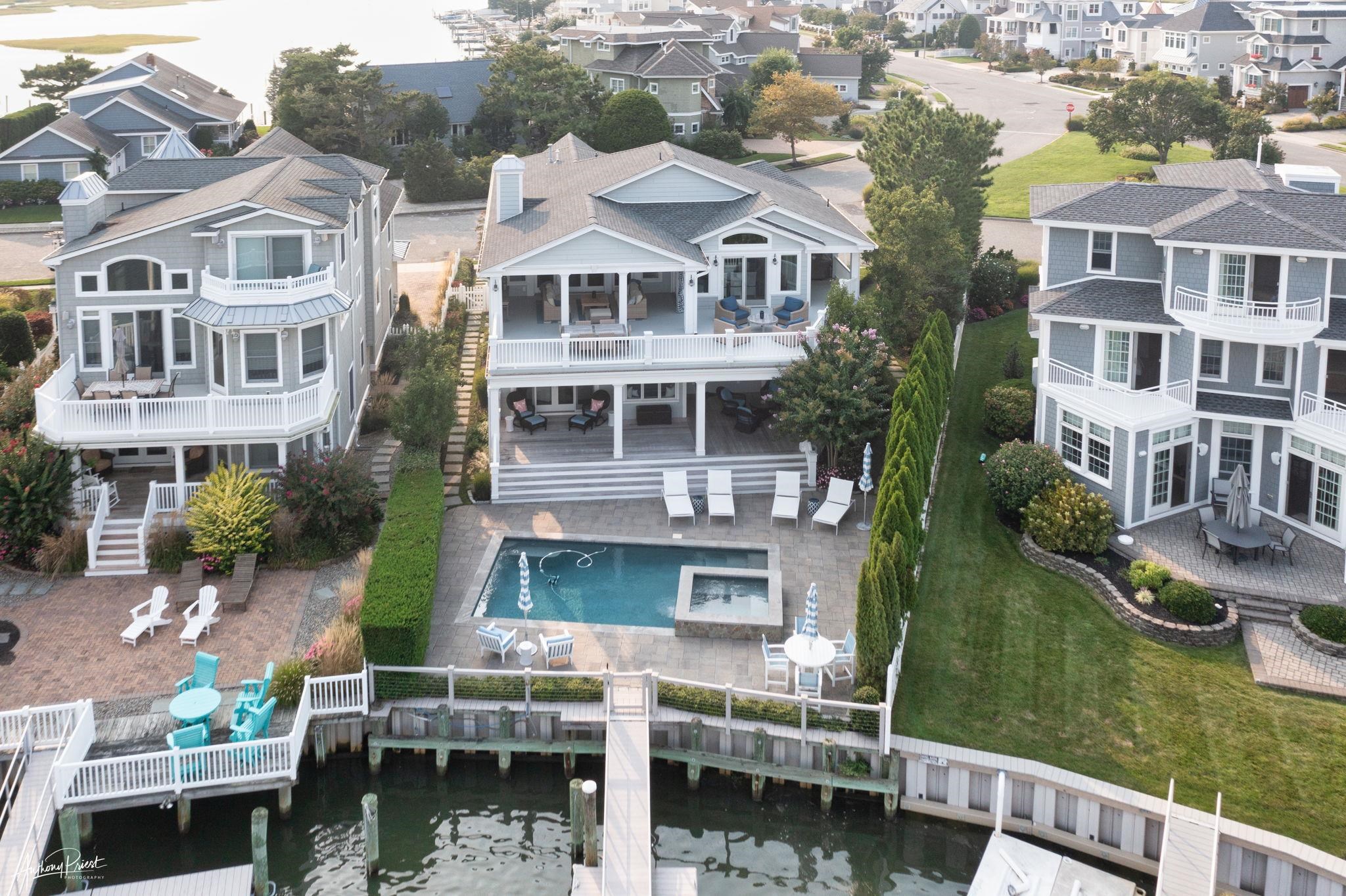 11 Heron Drive Avalon, NJ 08202 - Photo 5 of 29 a front view of a house with garden