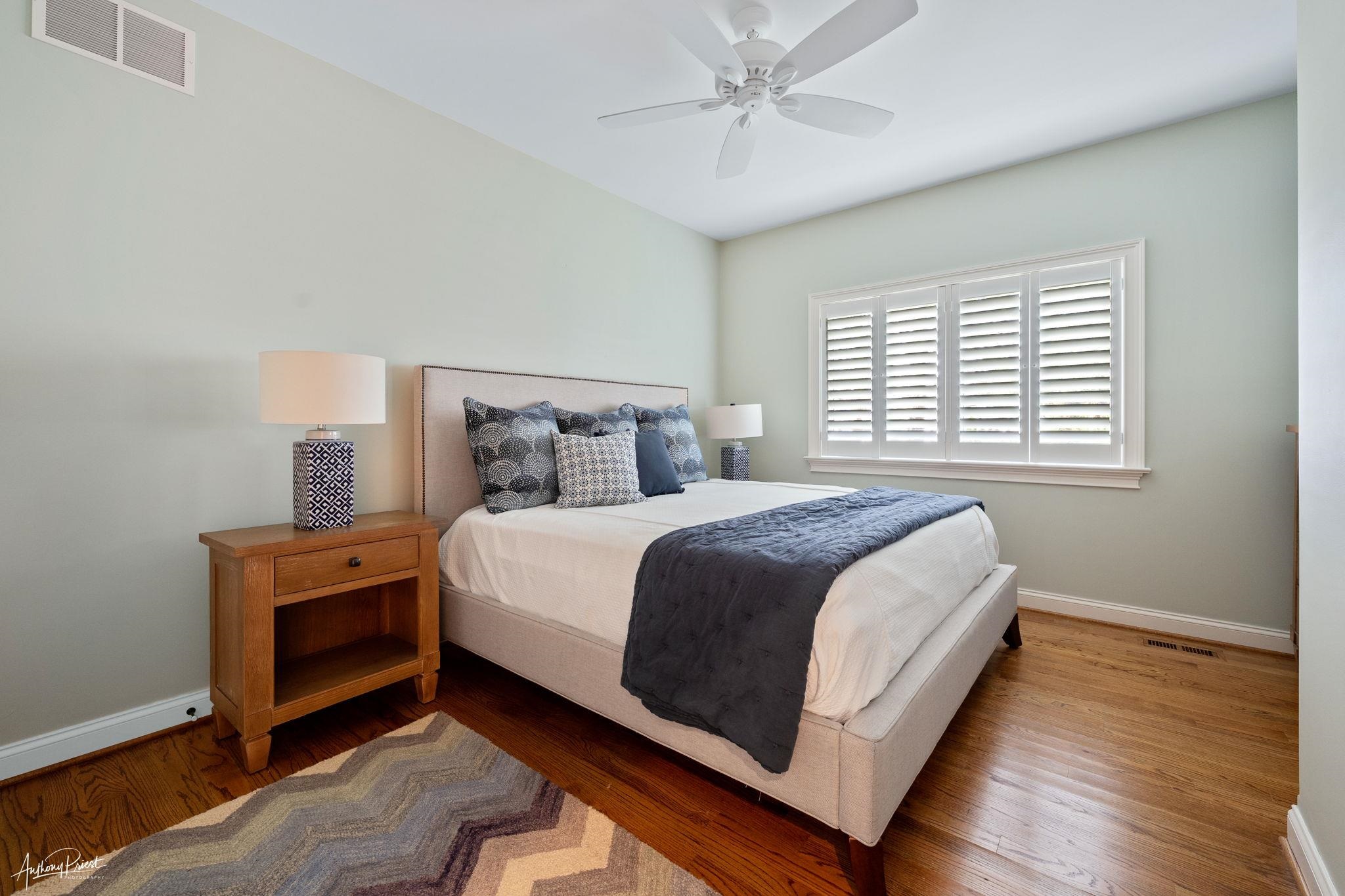 11 Heron Drive Avalon, NJ 08202 - Photo 10 of 29 a bedroom with a bed and a window