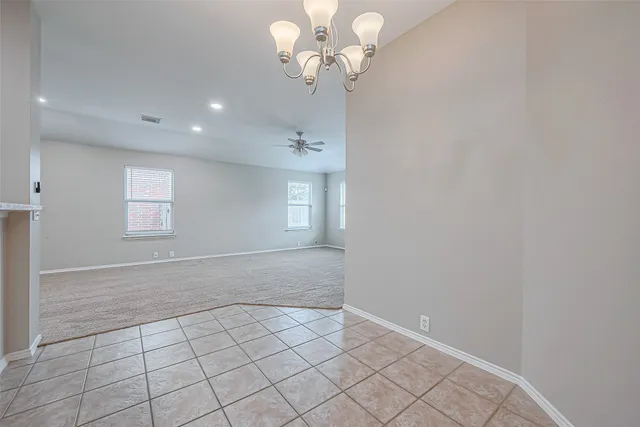 a view of an empty room with window