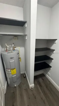 a storage room with wooden floor