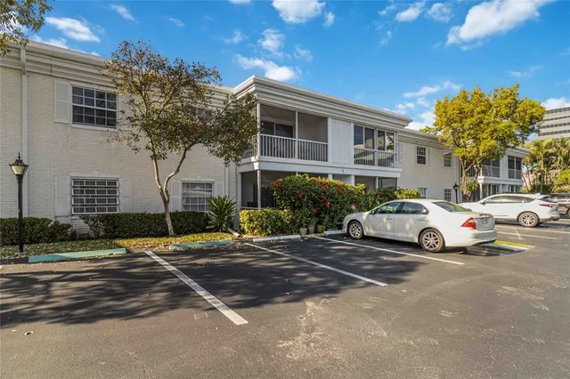a view of street with parked cars