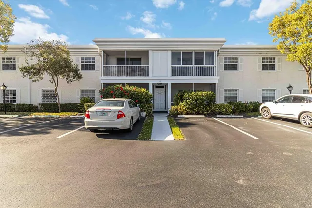a car parked in front of a house