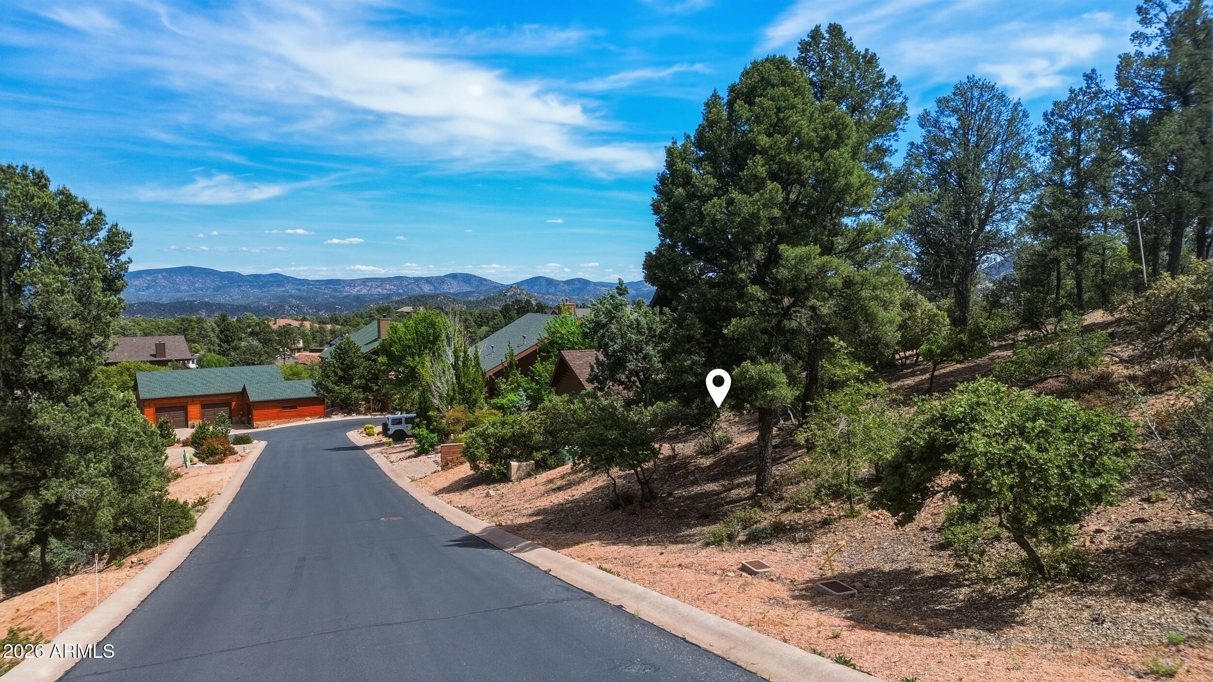 1911 East Starlight Pass, Unit 107 Payson, AZ 85541 - Photo 2 of 6 a view of a terrace with a garden