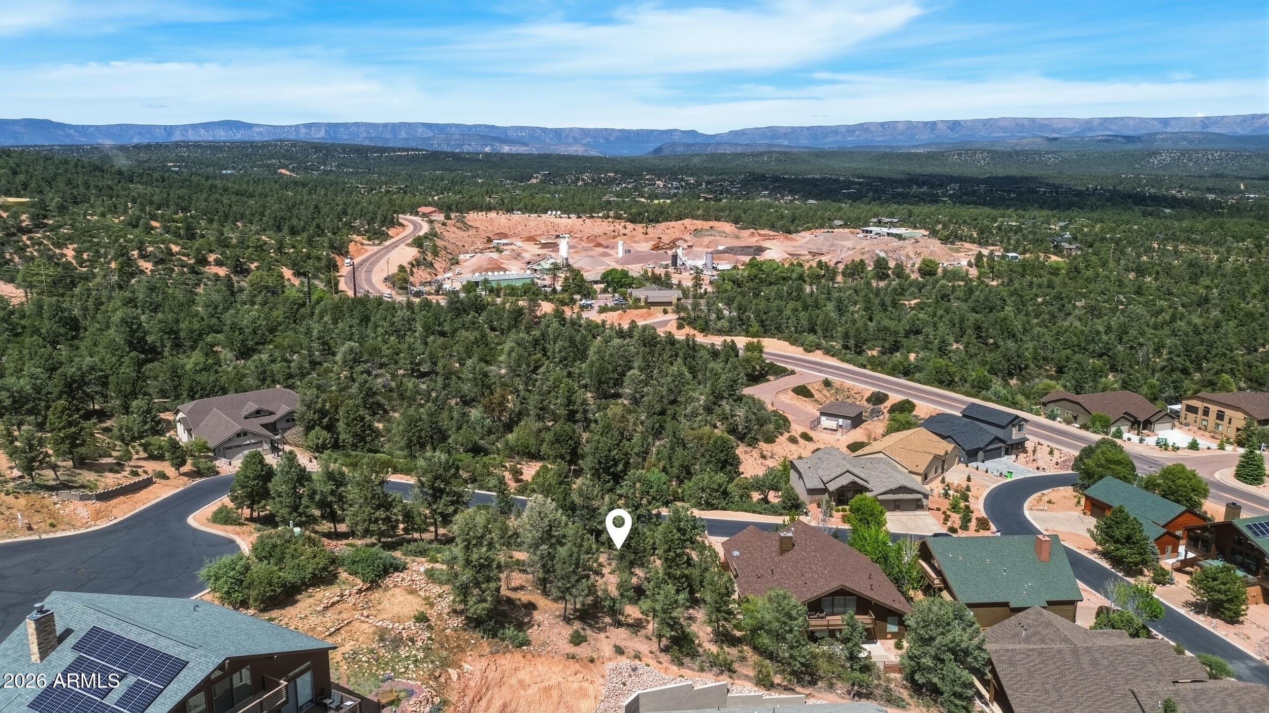 1911 East Starlight Pass, Unit 107 Payson, AZ 85541 - Photo 5 of 6 an aerial view of residential houses with outdoor space and trees