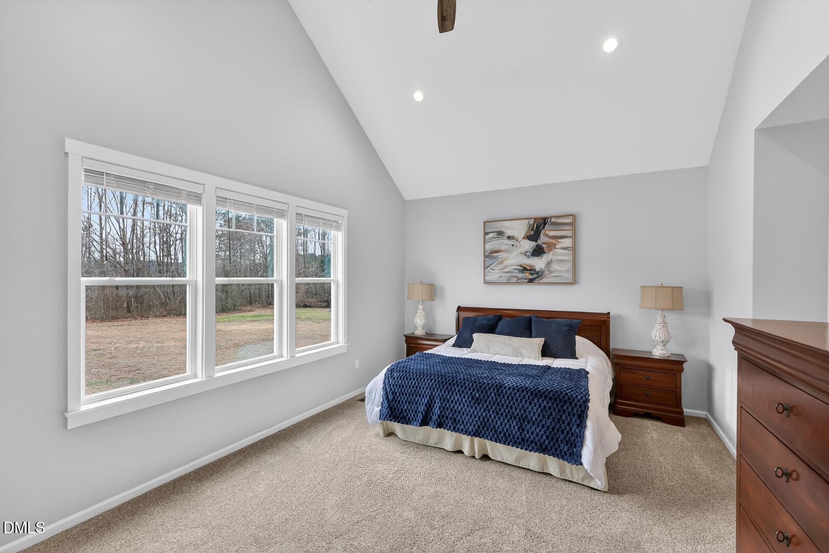 540 Pine Ridge Road Zebulon, NC 27597 - Photo 31 of 96 a bedroom with a bed and a window