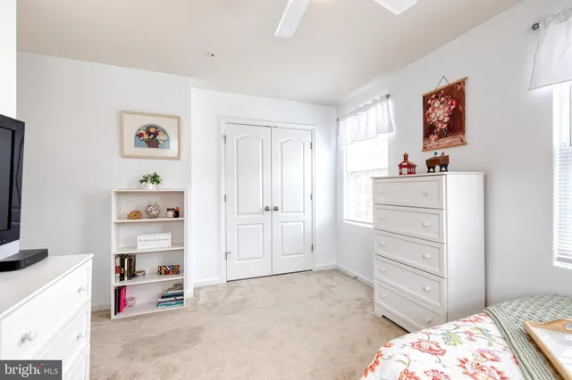 a bedroom with a bed and furniture