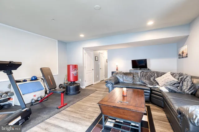 a room with furniture and a flat screen tv