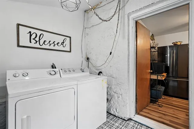 a utility room with dryer and washer