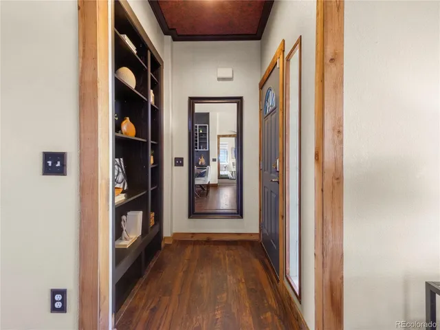 a view of an entryway with wooden door